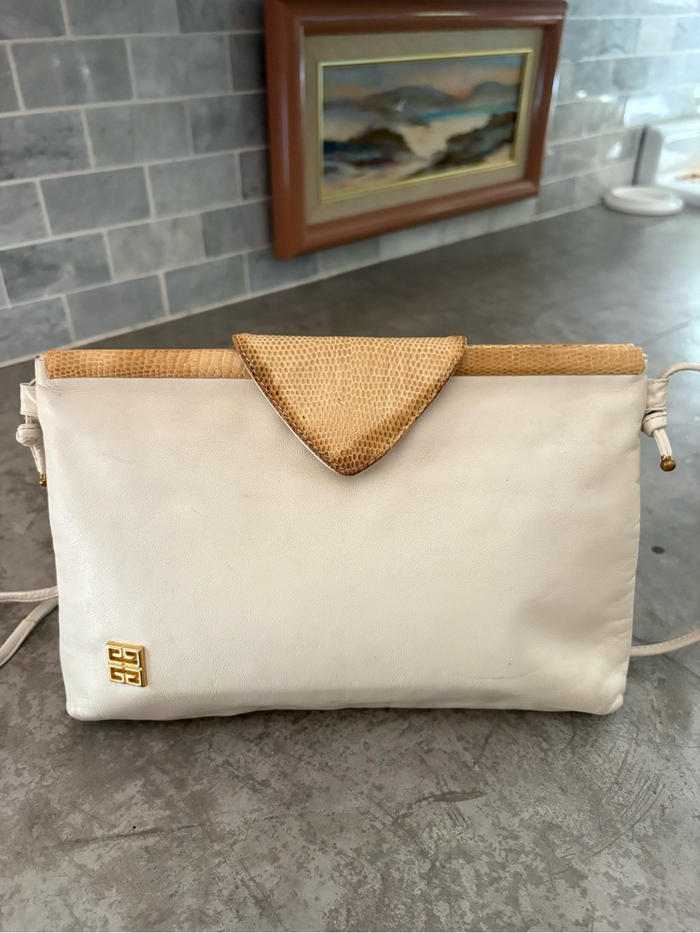 Vintage Givenchy cream and white leather clutch featuring exotic snakeskin trim
